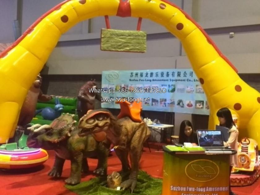 Fwu-long Dinosaur Rider display at 2014 IAAPA Orlando USA (1).jpg