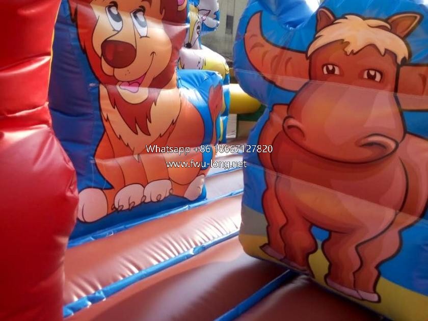 internal slide and bounce zone detail of animal inflatable play city.jpg