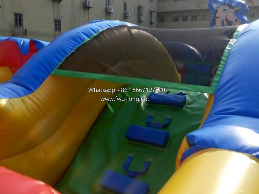 reinforced stitching and soft safety edge close-up of inflatable animal play city.jpg