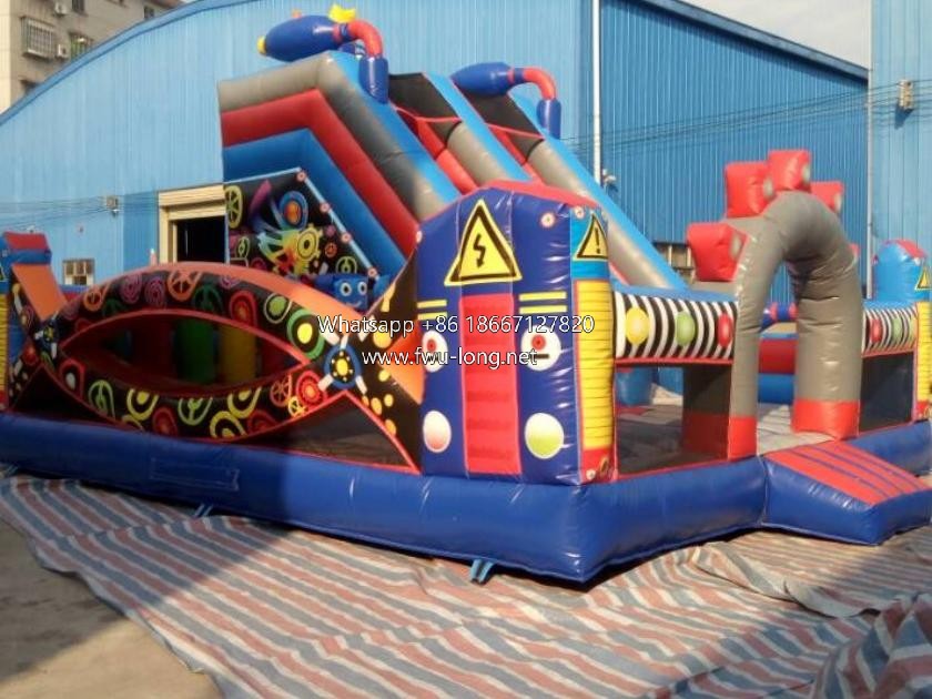 Internal bounce, slide and machinery decoration detail of industrial inflatable play city.jpg