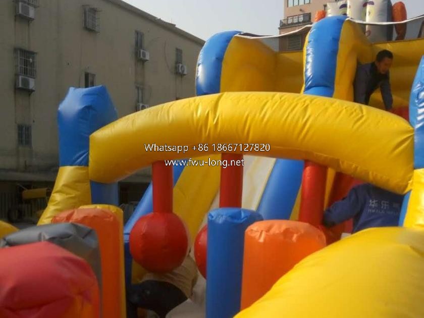 Real site operation photo of multi obstacle fun city at outdoor seasonal carnival fair.jpg