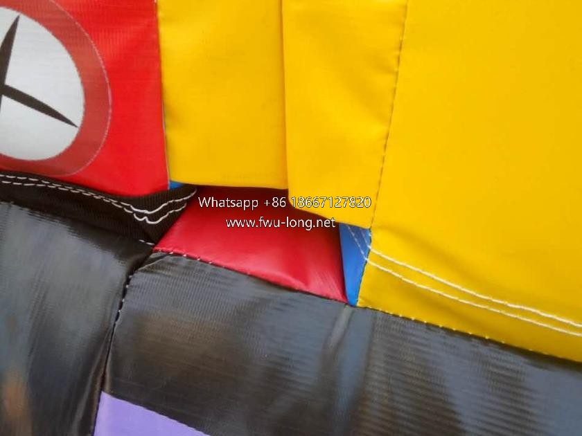 Reinforced stitching and soft safety buffer edge close-up of obstacle themed inflatable city.jpg