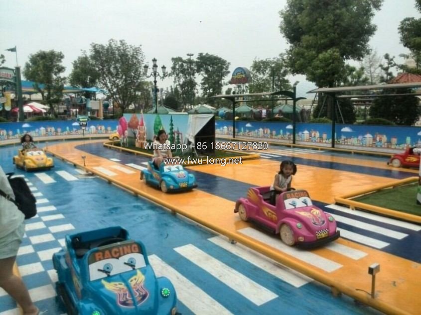 Kids simulated driving experience scene at indoor mall playground.jpg