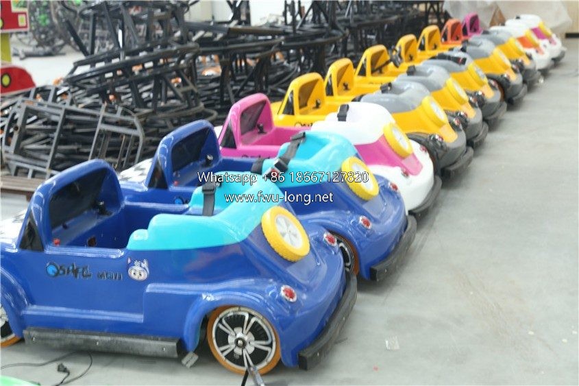 Full exterior shot of commercial kids electric driving amusement car.JPG
