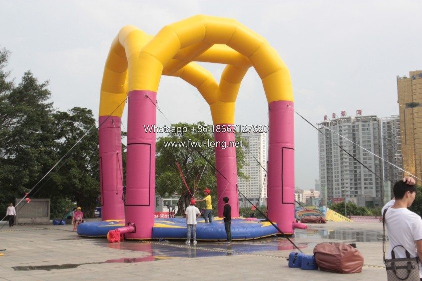 Full view of four arch column commercial inflatable bungee trampoline.JPG