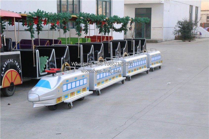 Full multi-car CRH bullet trackless train running on flat ground.JPG
